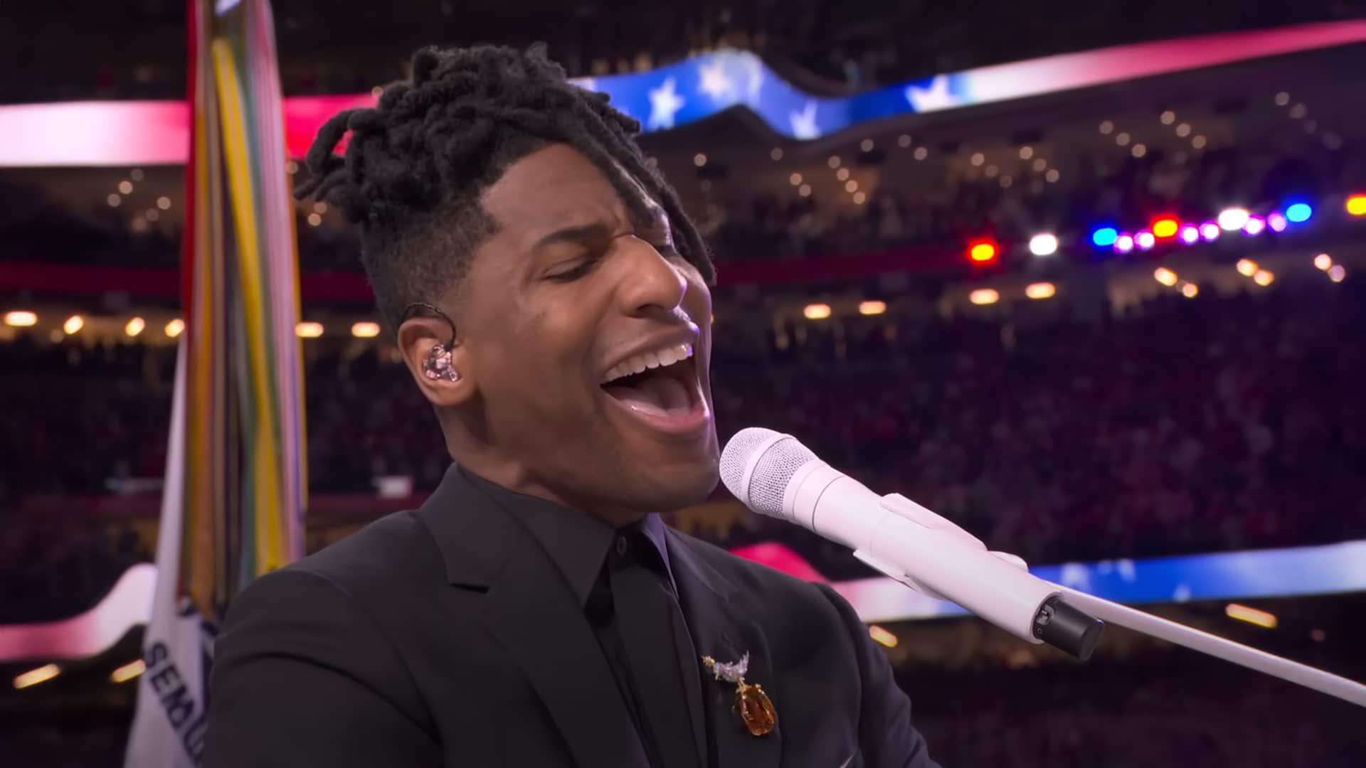 Jon Batiste performs a jazz-infused rendition of the national anthem at Super Bowl LIX in New Orleans, honoring his Louisiana roots.