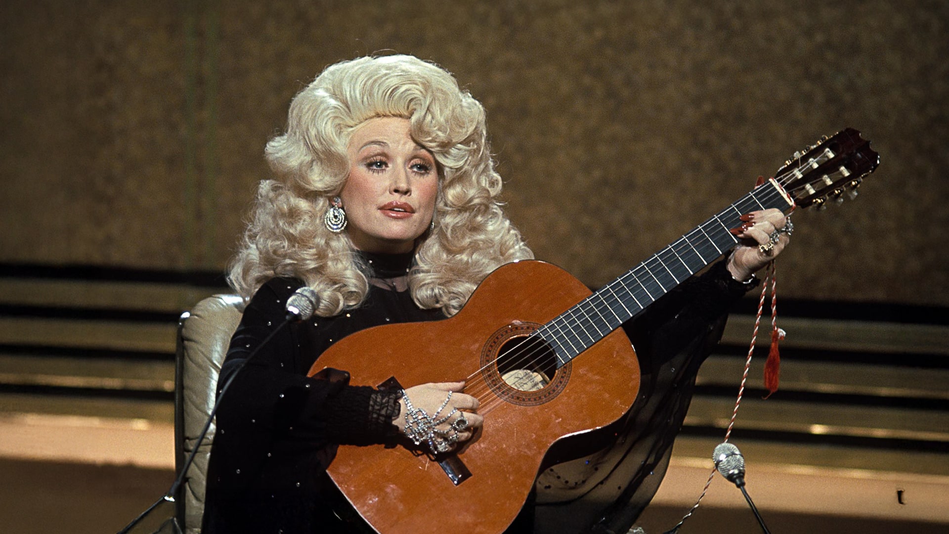 Dolly Parton wrote seven heartfelt songs for Carl Dean, capturing their nearly 60-year love story, from devotion to a final farewell.